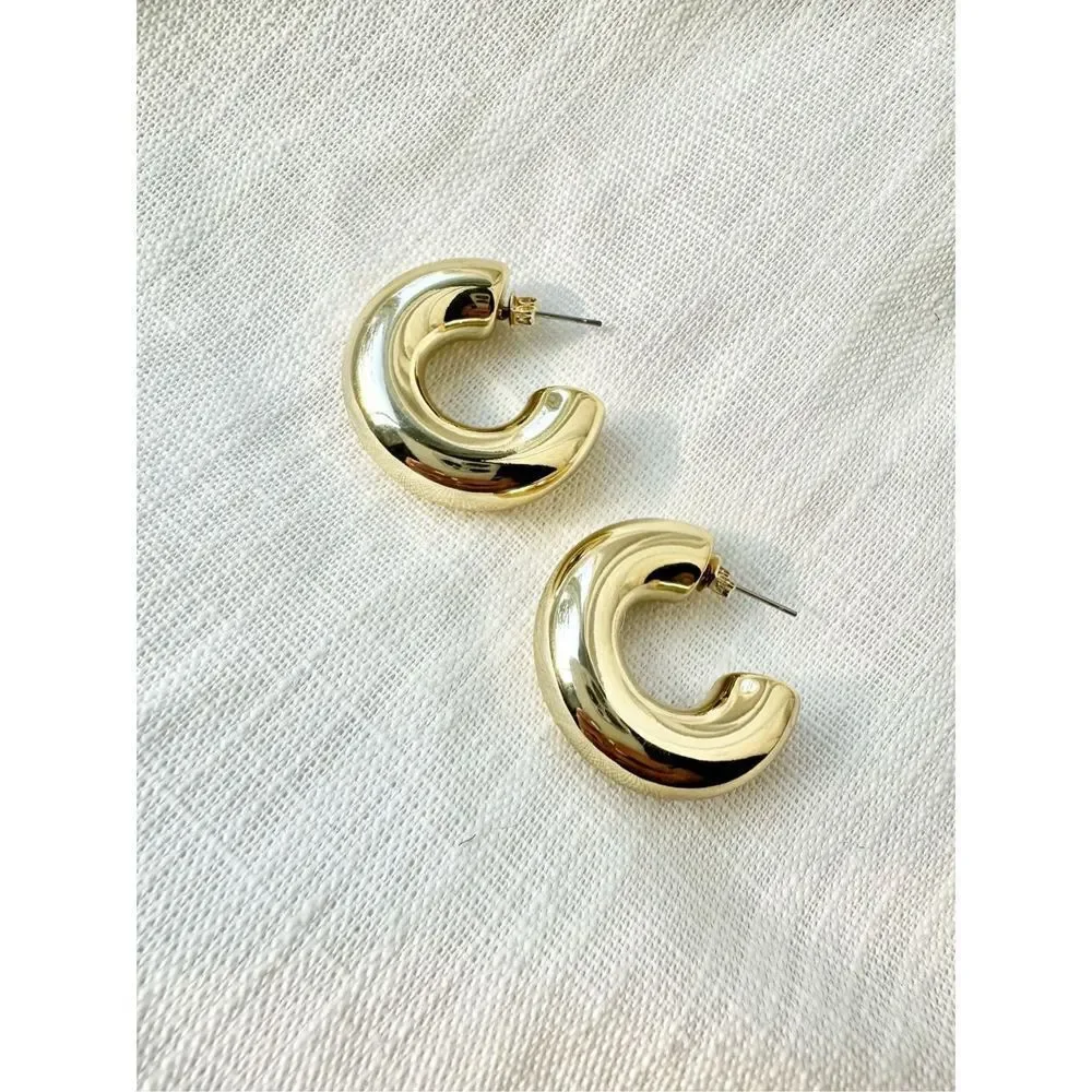 Minimalistic gold modern sleek hoops